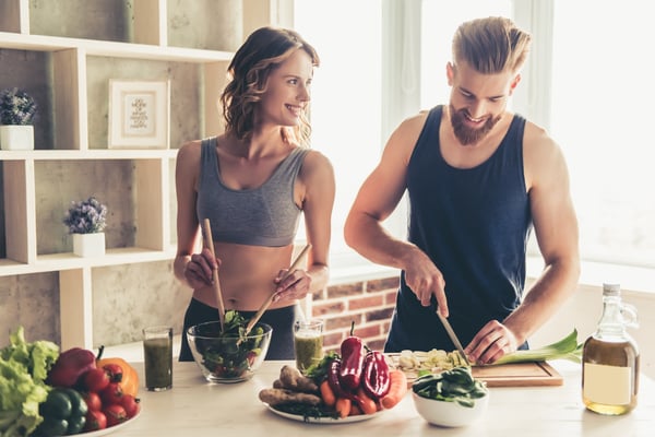 Couple cooking healthy food