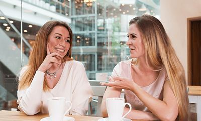 Girlfriends-getting-coffee-talking-about-the-OShot